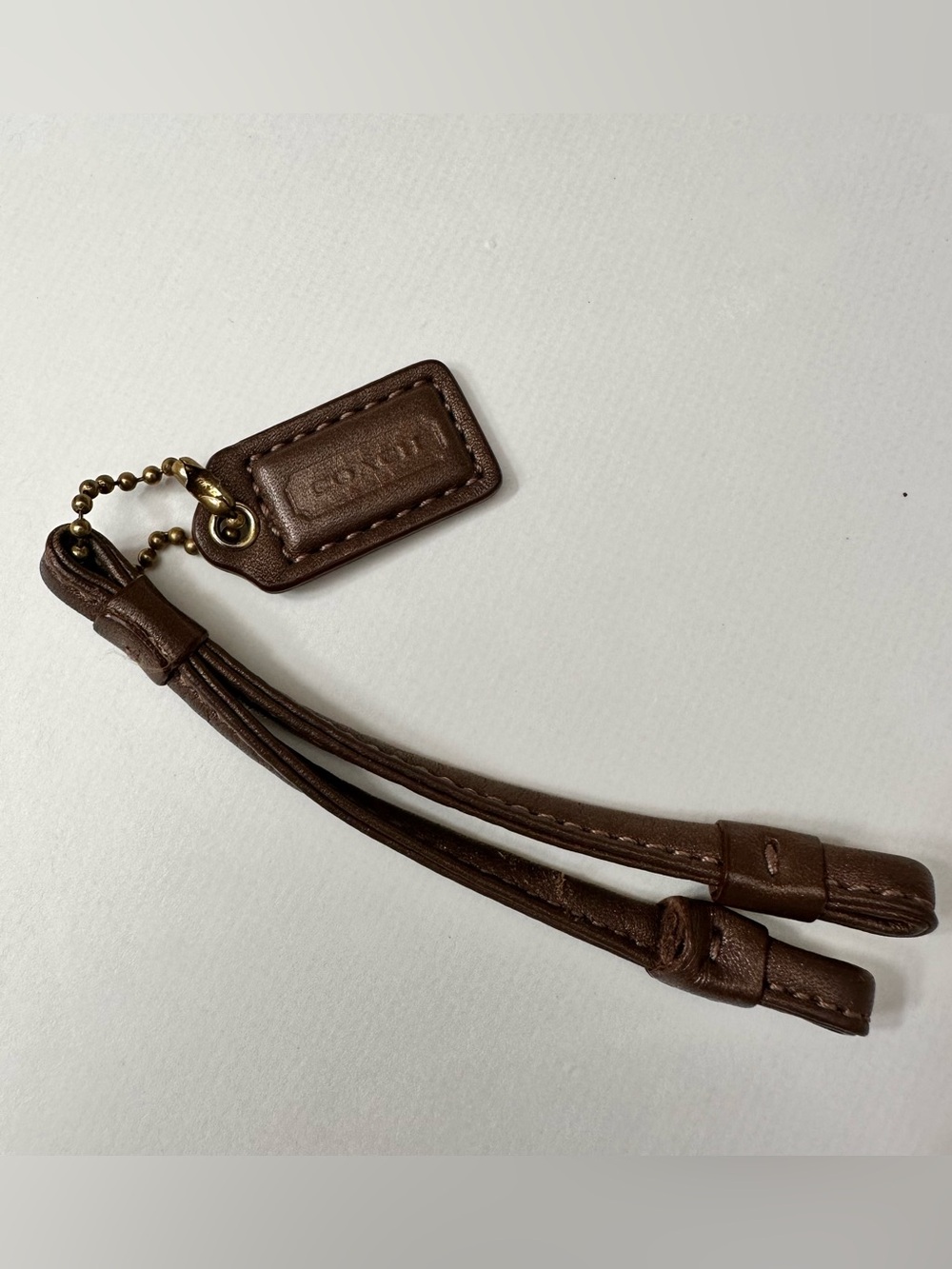Coach Brown Leather Tassel Key Charm with Logo Tag and Brass Chain